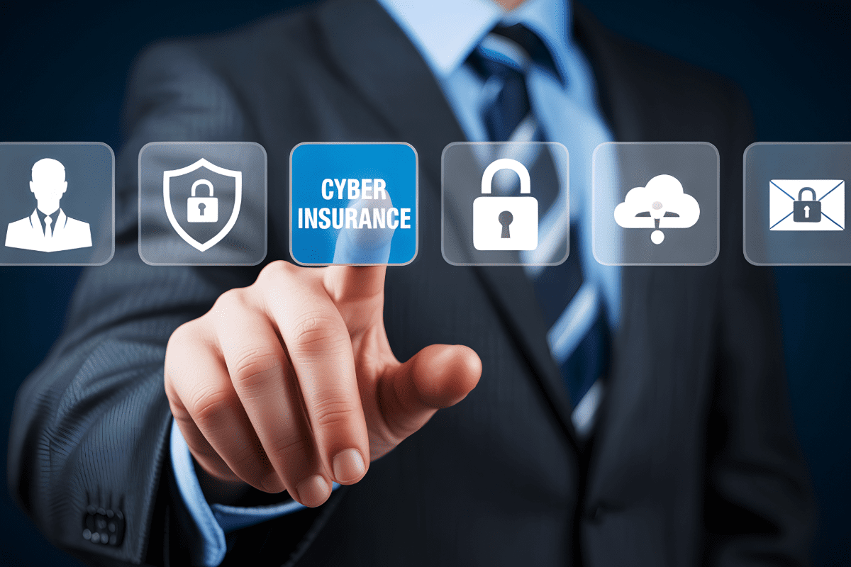 Man in background clicking a Cyber Liability button graphic